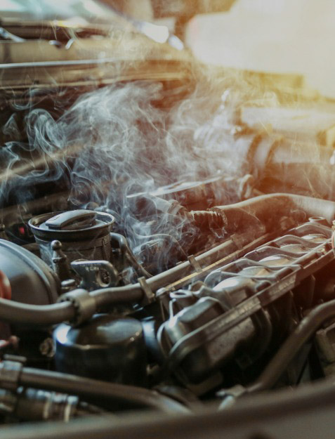 Imagem de um motor esquentando para falar da importância da manutenção preventiva