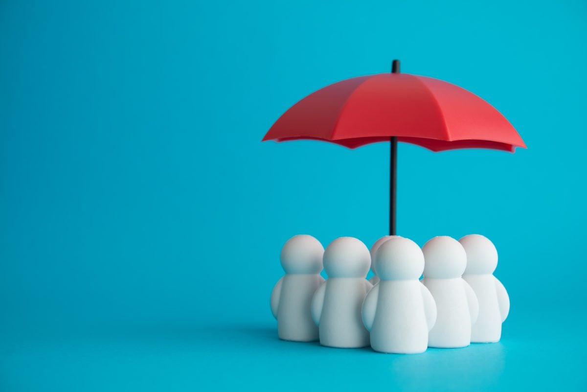 Ilustração simboliza o seguro de Vida em Grupo, representando proteção coletiva, cuidado com colaboradores e segurança financeira para equipes.
