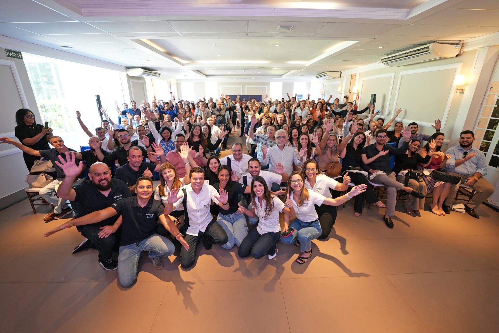 Corretores reunidos em sala durante treinamento +Capaz da Allianz